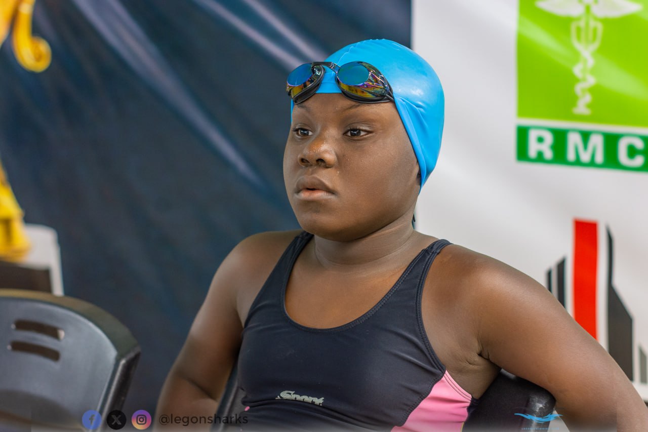 Young female athlete blue cap determined pre-race