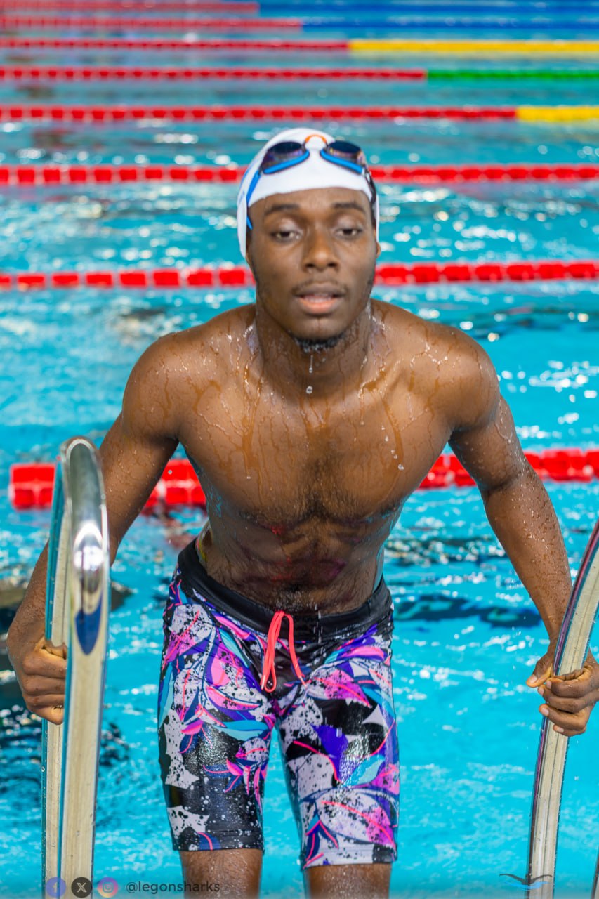 Senior male Legon Sharks swimmer poolside intense focus
