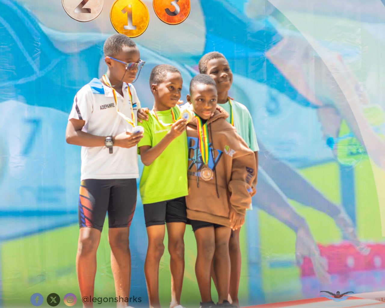Young medallists on podium