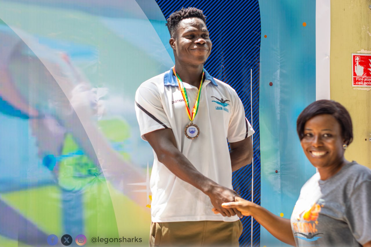 Jonathan receiving medal