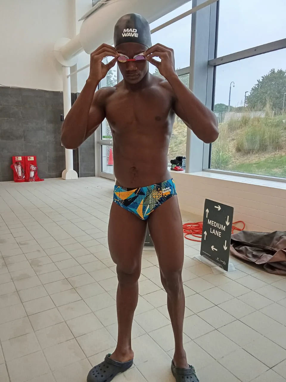 Promise Aheto preparing in swimming gear at the competition venue
